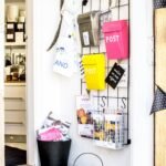 yellow plastic container on white wooden shelf